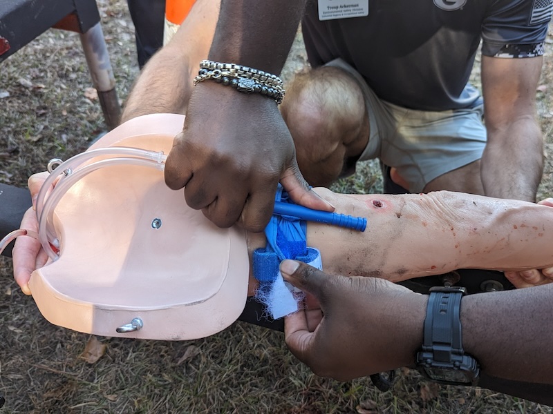 Closeup of a fake arm being used in a training.