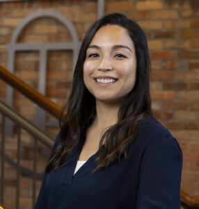 Environmental portrait of Clery Act Compliance Officer Angelia Nañez Burruss from the office of the Associate Vice President for Public Safety at the Hodgson Oil Building.